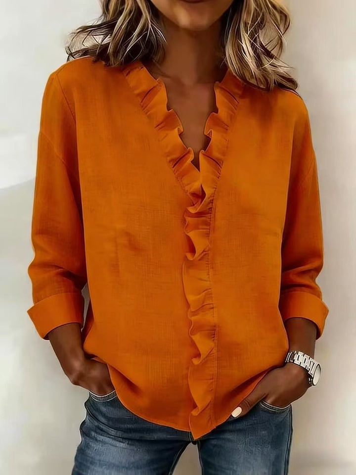 Chiara | Blusa con scollo a V e volant delicati