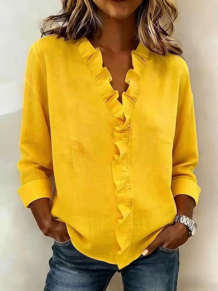 Chiara | Blusa con scollo a V e volant delicati