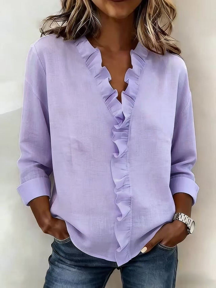 Chiara | Blusa con scollo a V e volant delicati