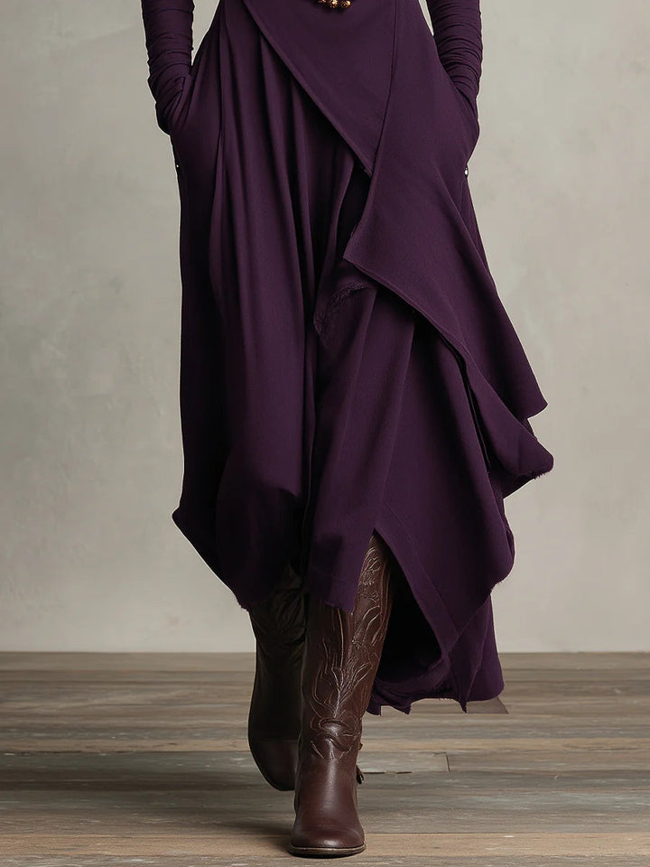 Vivienne | Abito lungo asimmetrico plissettato viola con collo alto